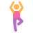 Person dancing with arms raised, wearing pink top and purple pants.